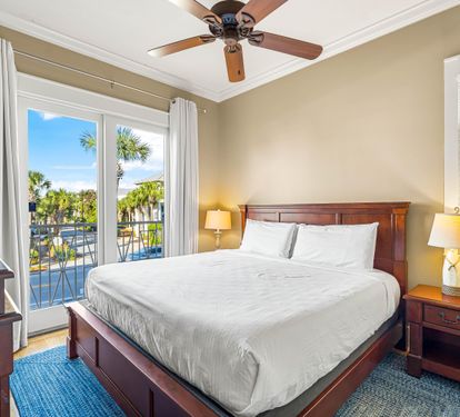 2nd Floor Guest Bedroom with TV & XBox 360, Walk-In Closet, Ensuite Bathroom, & Balcony Overlooking the Frangista Beach Community
