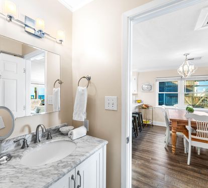 Convenience level: unlocked—a stylish half bath with a full size washer/dryer
