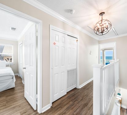 This upstairs hallway leads you straight to beachside bliss