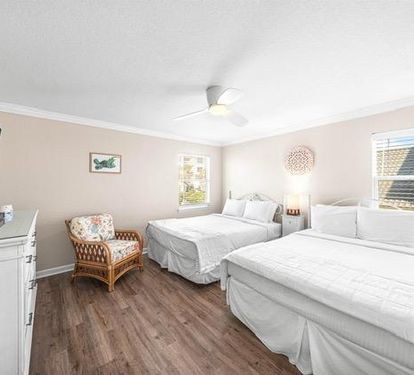 Double the queen beds, double the comfort, and a smart TV to keep you entertained all night long in this 2nd floor guest bedroom