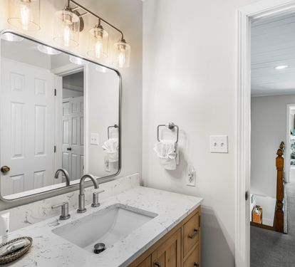 This is the full bathroom with a bathtub/shower combination for the queen bedroom, with access out to the hallway.