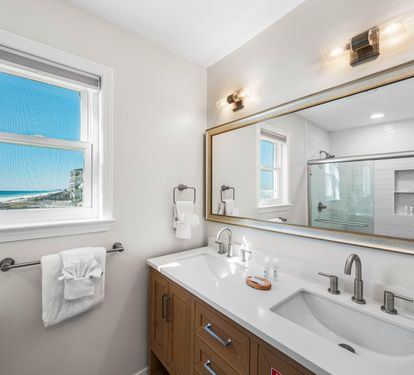 Primary ensuite full bathroom  with a walk-in shower.