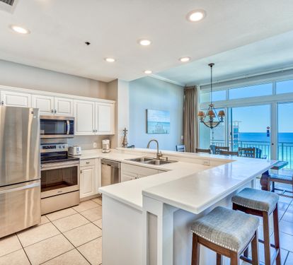 Fully Stocked Kitchen with Stainless Steel Appliances
