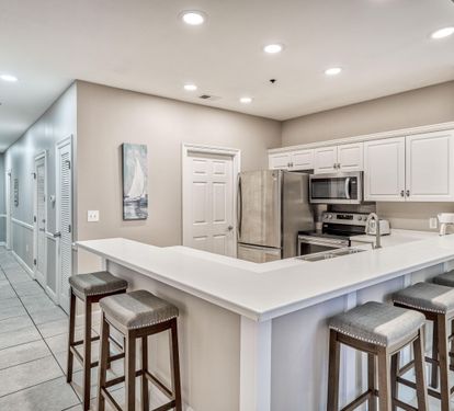 Fully Stocked Kitchen with Stainless Steel Appliances, Bar Seating for 6