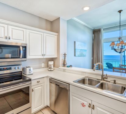 Fully Stocked Kitchen with Stainless Steel Appliances