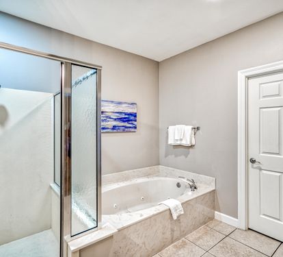 Master Bathroom with Soaking Tub and Walk In Shower