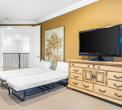 Second Floor Primary Bedroom- Twin Cots are in the closet and can be used anywhere in the home