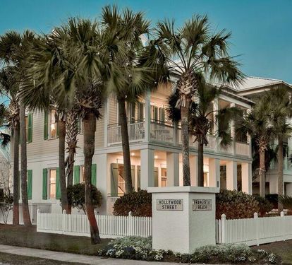 Welcome to Southern Comfort!!! A Classic Coastal Home Designed with Hardwood Floors, Porches, High Ceilings, and a Tropical Landscape