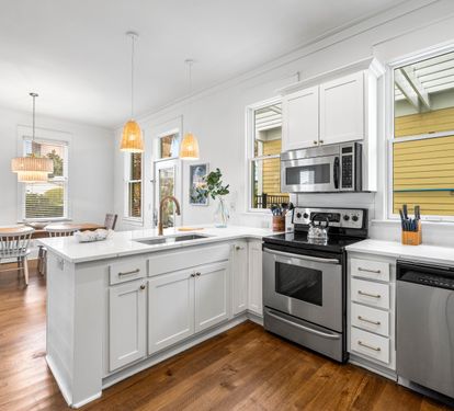 Newly Remodeled Fully Stocked Kitchen with Quartz Countertops, Stainless Steel Appliances & Walk-in Pantry