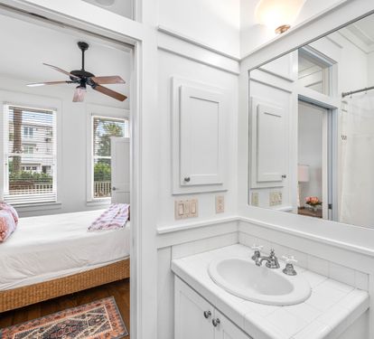 1st Floor Bedroom with Queen Bed, 32" YouTube TV, and Full Bathroom with Bathtub/Shower Combination.