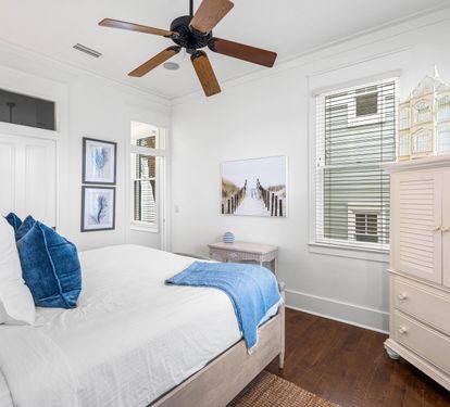 2nd Floor Bedroom with King Bed, 32" YouTube TV  inside the Armoire, Ensuite Bathroom & Access to the Outdoor Balcony facing the Gulf.