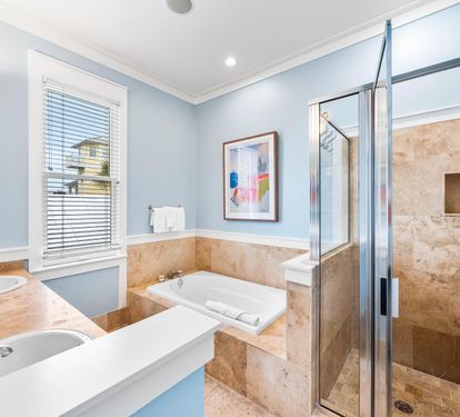 Primary Ensuite Bathroom for the King Bedroom has Soaking Tub, Walk-In Shower, Double Vanities, & Water Closet.
