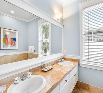 Primary Ensuite Bathroom for the King Bedroom has Soaking Tub, Walk-In Shower, Double Vanities, & Water Closet.