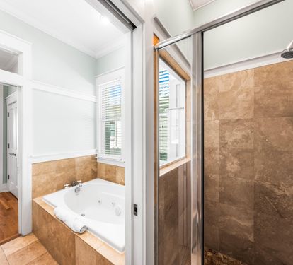 Walk-in shower in the primary ensuite bathroom.