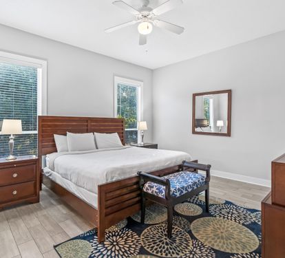 Second floor primary bedroom with ensuite bathroom & 50" Smart TV with cable.