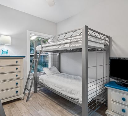 First floor bunk bedroom with 2 sets of twin over twin beds & a 31" tv with cable.