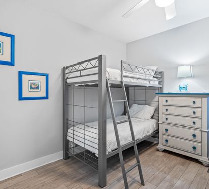 First floor bunk bedroom with 2 sets of twin over twin beds & a 31" tv with cable.