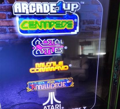 The kids will enjoy this 4 game Pac Man Arcade in the living area.