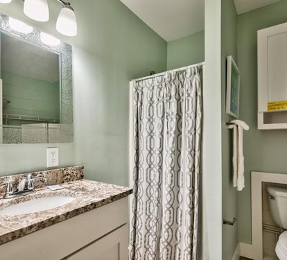 Full Bathroom for Double Queen Bedroom has a Walk-In Shower;   a full-size Washer & Dryer is also located in this bathroom.