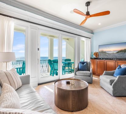 Elegant Furnishings Continue in the 2nd Floor Living/Dining Area with 65" Smart TV with Cable, Dining Table for 6 & Bar Seating for 2.  Covered balcony with outdoor seating and dining table for 6 - all with Gulf Views!