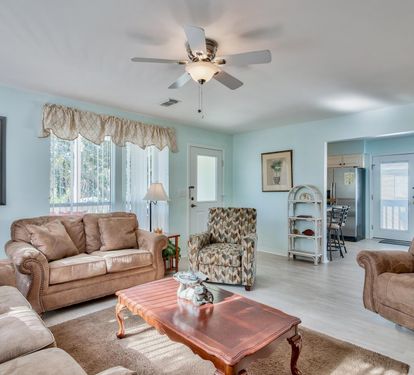 Open Living Room w/ Queen Sleeper Sofa, Flat Screen Television