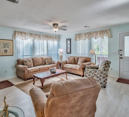 Open Living Room w/ Queen Sleeper Sofa, Flat Screen Television