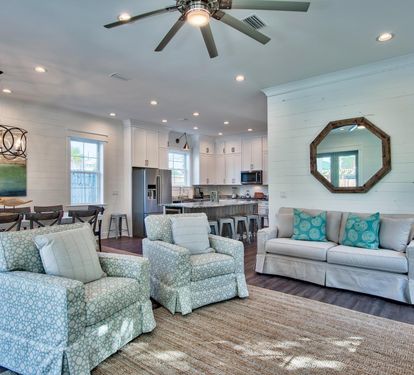 Open Living Room w/ 65 Inch Flat Screen