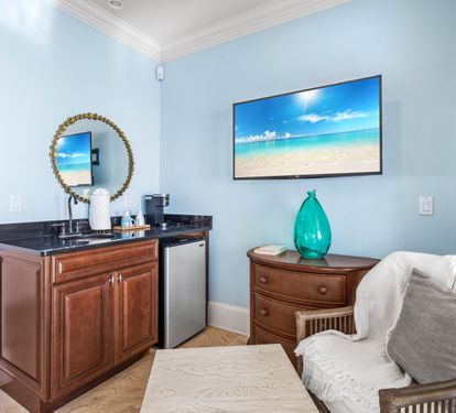 First floor king bedroom with wet bar, beverage cooler and Keurig coffee set-up