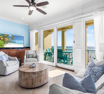Living Room with a View!! and a 65" Smart TV with Cable.
