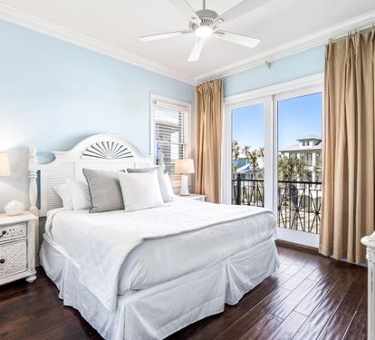 Third floor bedroom with king bed, ensuite bathroom, 42" smart tv and views of the Frangista Beach community.