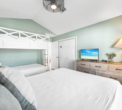 This Room has a Dresser to Unpack those Suitcases and a large Closet with a Front Yard View!!