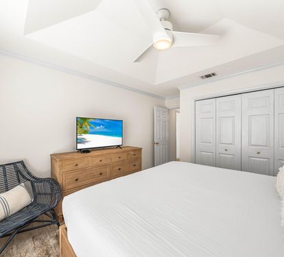 King Bedroom with a Pool View, Large Dresser, Night Stands for Placing your Favorite Book and a Large Closet!!  42" Cable TV and Additional Seating
