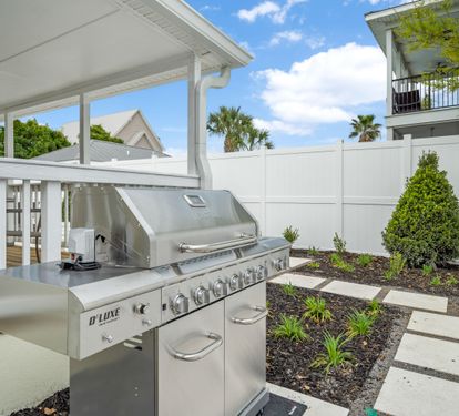 Large 5 Burner Stainless Steel Grill Just off of the Covered Outdoor Dining Area and We Provide the Propane!!