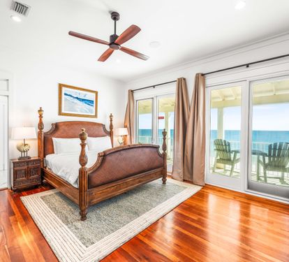 Wake up to the sound of the waves in your spacious primary king-sized bedroom on the 3rd level with private beachfront balcony, queen sleeper sofa, armoire with tv, elevator access, & stunning primary ensuite bathroom.