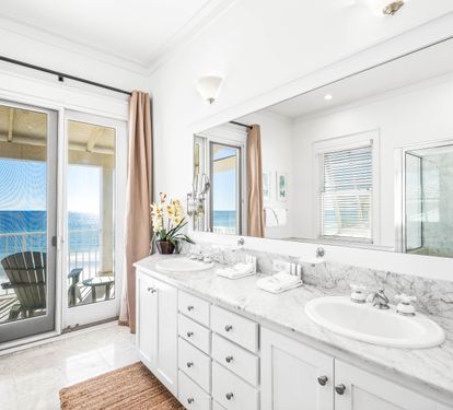 Walk-in shower, jetted tub, two sinks, marble vanity and one stunning view!   This is your primary bathroom on the 3rd floor and it is pure luxury.