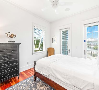 3rd floor northwest bedroom with queen bed, tv  & ensuite bathroom!  Balcony overlooking the Frangista Beach community.