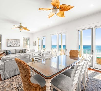 Dine with a view or lounge with a breeze in the 2nd 
 floor great room with balcony.   Space for everyone in this living/dining area, chef's kitchen, 50" tv,  expansive views of the Gulf, covered balcony the width of the home on all 3 levels!