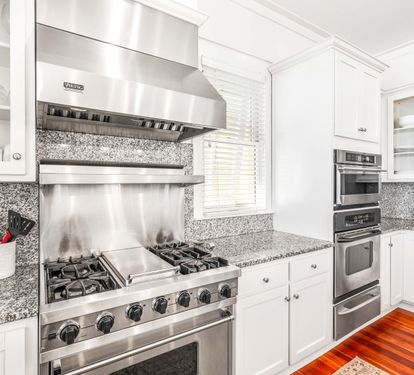 Cook like a pro in a kitchen that’s ready for a five-star feast!   This is one well-equipped and well stocked  kitchen.  Viking gas range, convection oven over electric oven with a warming drawer.