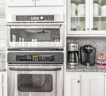 Advantium microwave/convection oven with an electric oven and warming drawer below.  Double the food and double the fun.