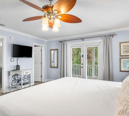 2nd floor King bedroom #2 with balcony access, ensuite bathroom & 38" smart tv.