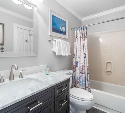 Bathroom with bathtub/shower combination for the king bedroom #2.   Can be accessed directly from the bedroom as an ensuite or from the hallway.