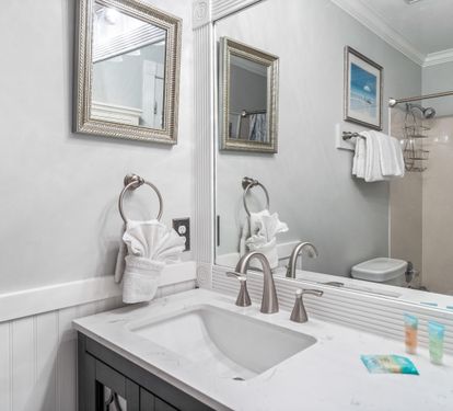 Bathroom with bathtub/shower combination for the primary king bedroom #3