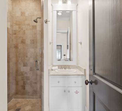 Bathroom - Equipped with a Walk In Shower & Single Vanity