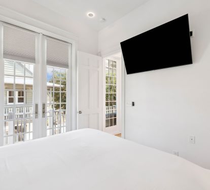 Primary King Suite - Flat-Screen TV + Balcony Access