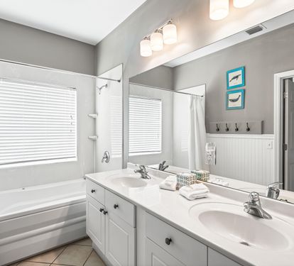 Private Bath with Double Vanity and Shower/Tub Combo