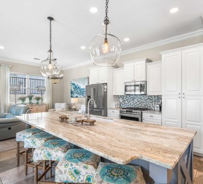 Fully Stocked Kitchen with Stainless Steel Appliances