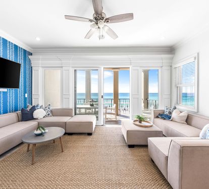 Second Floor Living area with Two Sectional Sofa's Offering a Better Seating Space. A Large Smart TV to Catch all the Favorite's