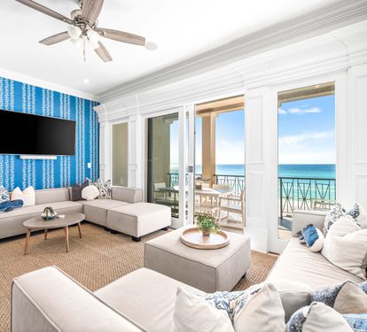 Second Floor Living area with Two Sectional Sofa's Offering a Better Seating Space. A Large Smart TV to Catch all the Favorite's