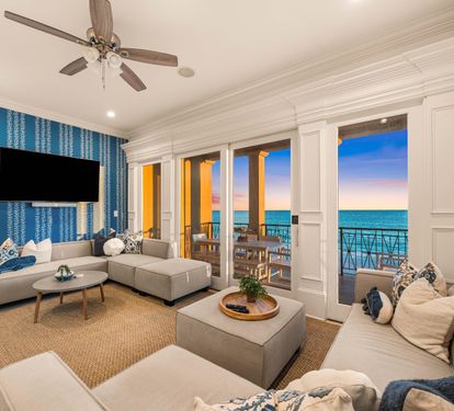 Second Floor Living area with Two Sectional Sofa's Offering a Better Seating Space. A Large Smart TV to Catch all the Favorites