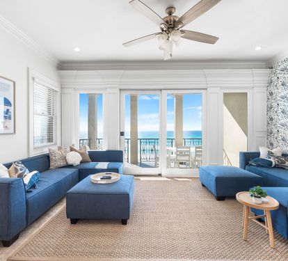 Second Floor Living area with Two Sectional Sofa's Offering a Better Seating Space. A Large Smart TV to Catch all the Favorite's